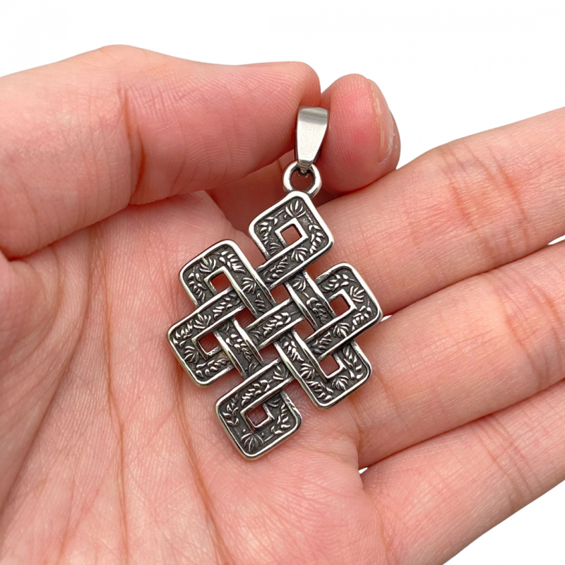 Ciondolo nodo infinito tibetano in acciaio inox - 4 cm