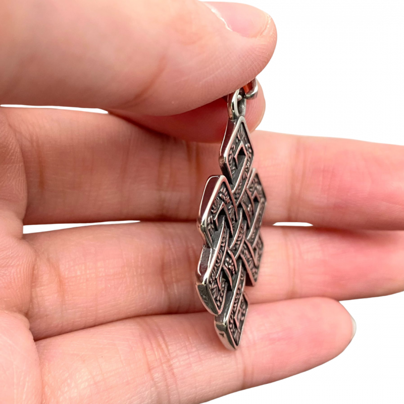 Ciondolo nodo infinito tibetano in acciaio inox - 4 cm